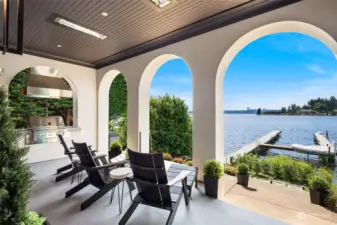 Relish year-round waterfront views from the covered living area, complete with a built-in BBQ for ultimate outdoor enjoyment.
