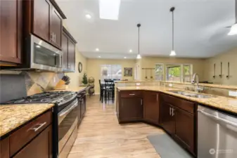 Granite counters and under mount lighting make this area sparkle