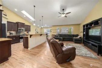 The popular open concept floor plan is perfect for entertaining and features new flooring