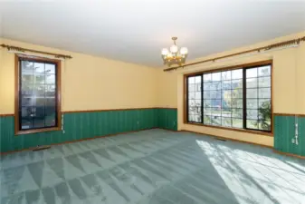 Large windows overlooking the front of the home.