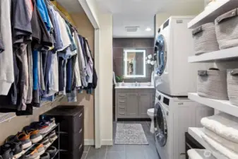 Laundry is conveniently located near the primary bedroom closet and en-suite bath.