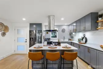 The island counter seating delivers an ideal gathering place.