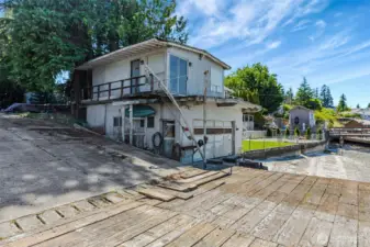 Another view of the west boathouse. The building was framed with oversized studs and heavy timber beams.  The office was located on the upper floor.
