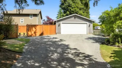 Detached 2-car garage (nearly 500 SF) offers ample space for parking, storage, or your next creative project.