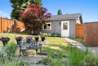Access to the backyard from your garage!  Also cedar fenced backyard!