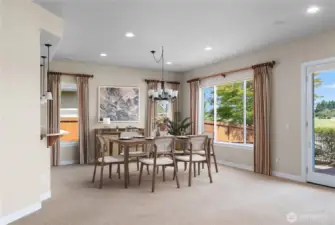 Natural light filled Great Room and Dining Room with 10 Ft Ceilings throughout.