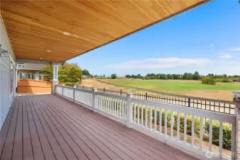 Large covered Trex Deck with stunning territorial and 3 Fairway views. All complimented by a paved patio and side yard sitting area.