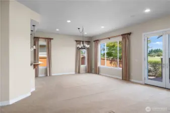 Natural light filled Great Room and Dining Room with 10 Ft Ceilings throughout.
