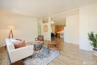 This is your view as you enter your home. The office/bedroom is to your right (beyond the right edge of this photo), the Primary is through the open door to the far left edge of this photo near the opening to the kitchen.