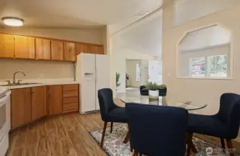 You back is to the utility room. Ceilings are vaulted providing more light and spaciousness.
