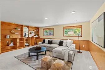 Another view of the giant bonus room. The built-in shelves add extra storage and there is even plumbing for a wet bar.