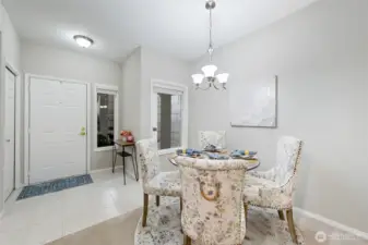 From the Dining Room looking toward the entry we're able to see the coat closet and how wide the entry is.