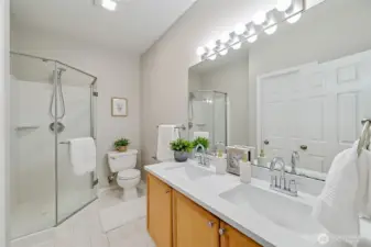 Gorgeous Primary Bathroom with new quartz countertops with double vanity. Good sized step in shower to get you going in the mornings.