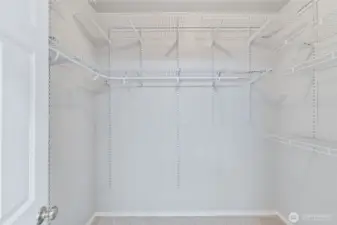 Another generously sized room...the walk-in closet. Organized for all your storage needs.