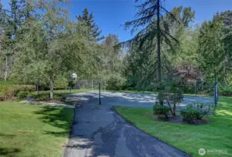 Private community basketball court is located at the backside of the community.