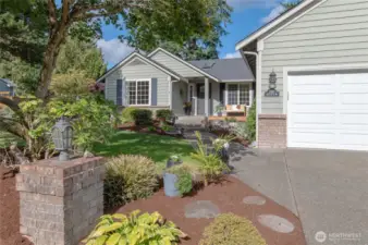 Ample parking for multiple vehicles in the driveway and 2 car garage.