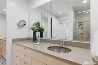 Here's a closer look at the bath vanity with plenty of counterspace.