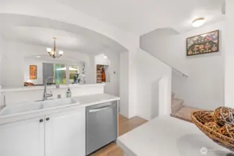 The bright kitchen showcasing the seamless connection to the main living areas, a true open layout designed for gathering and easy everyday living.