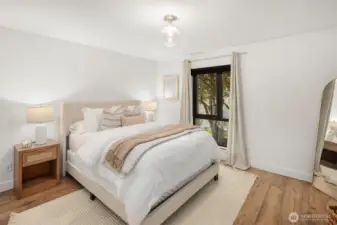 Primary is king-sized (queen shown)! Hunter Douglas Duolite top-down- bottom up shades with light filtering and blackout options!