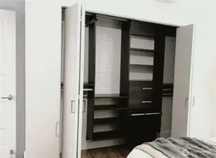 Primary Closet with custom organizers to maximize space! (photo taken when home was vacant)