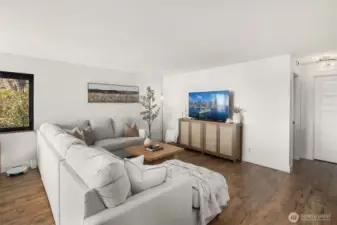 Another view of the generous family room. TV can work on either wall in this nook.