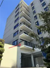 unit 101 has an elevated West facing deck with views to Elliott Bay and beyond! Gate to Secure parking deck B.