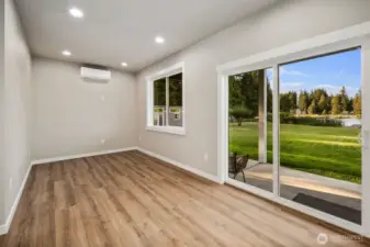 Slider doors leading out to covered patio.