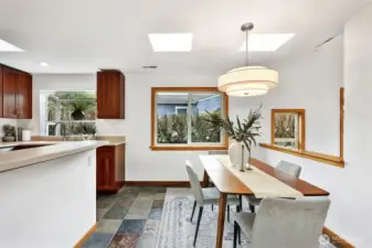 Host dinner parties with ease thanks to the serving bar, space for a full dining set and a flow through kitchen with two exits.