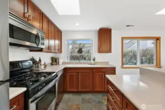 The laurel hedges outside were just trimmed, but by summer they'll be leafing out and bright green again! What will you grow in your sunny east-facing garden window?