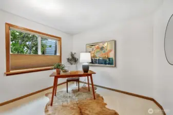 One of two downstairs bedrooms: great as a home office, or a perfect nursery thanks to blackout blinds.