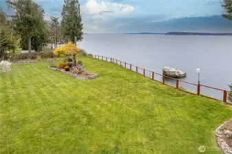 There's so much value in this 5-acre home on 202' of glorious waterfront!