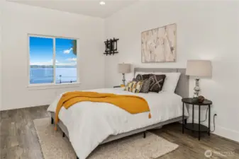 This flex space in the attached apartment is staged as the bedroom. Former owners used it as a work-out room.