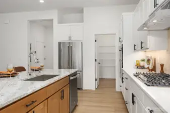 Kitchen has extra large pantry