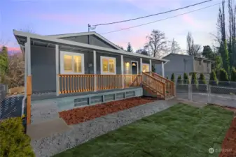 Covered Front Porch for the Upper Floor. Fully Fenced Front Yard. Parking for 4-Vehicles in Front.