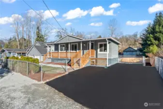 A/Main Floor: Newly Sealed Driveway with Parking for 4 Vehicles. Fully Fenced Front Yard. New Stairs to Backyard. Entry is off Covered Front Porch.