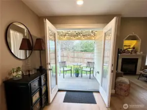French door that open to the covered back patio