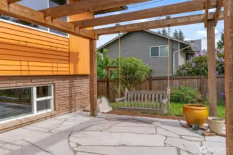 Porch swing for coffee drinking and garden planning