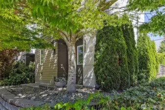 Mature landscaping makes this home feel like  you're living in a tree house!