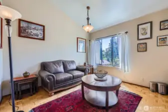 The sunny family/breakfast room is a welcoming space to enjoy your morning Java.