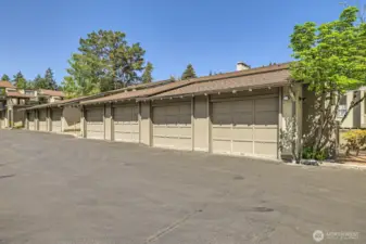 The huge 1-car garage includes plenty of enclosed storage space. Nearby, there is a second deeded parking space and plenty of guest parking.