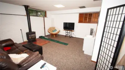 Plenty of space. It even has s small sink cabinet. There is also a door leading to the lower primary 3/4 bath.