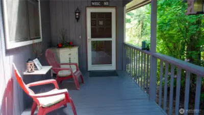 Very enjoyable peaceful front covered porch main entry.