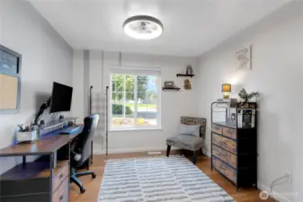 Main level office with new light with built in fan.