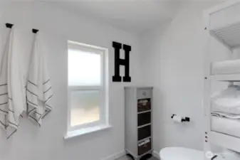 Primary has separate toilet and shower tub combo.  All new!