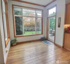 Bright & Large Breakfast nook surrounded by windows and your garden!