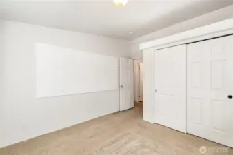 Another view of the 2nd guest bedroom with sizable closet.
