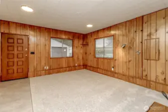 Note: Family Room was a 2 car garage in the past it is converted to living space so front garage is truly 1/2 garage great for storage workshop or hobby room. New carpet & flooring.