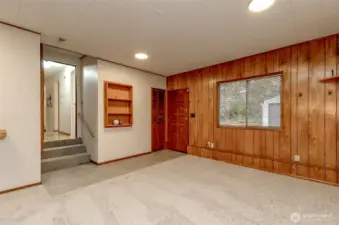 Main floor family room with access from the back garage/shop for easy access.