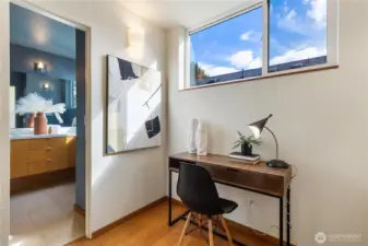 The stair landing upstairs is extra large and well-lit, great little nook for a desk or reading chair.