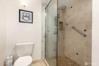 Private water closet area adds comfort and functionality to the primary bath layout.